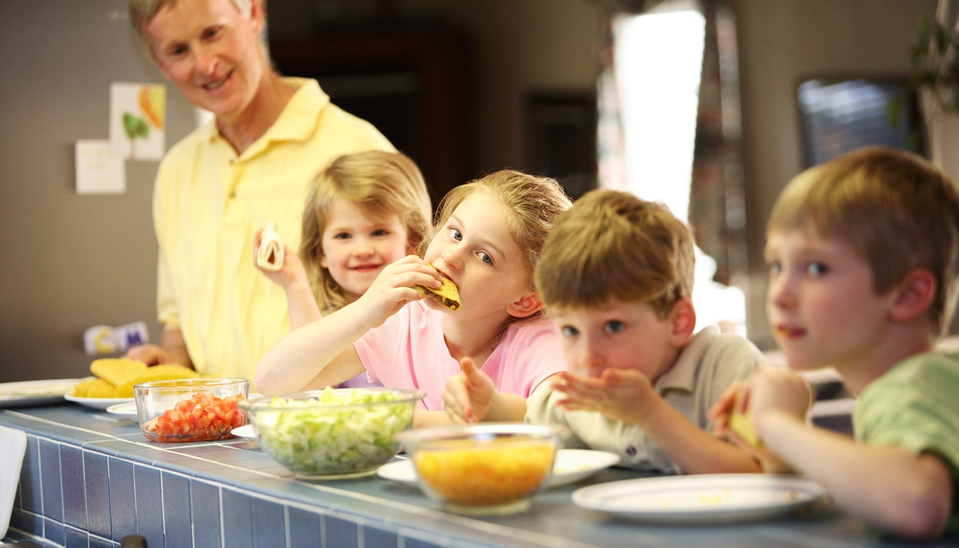 Family enjoying taco Tuesday dinner